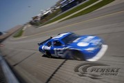 The Alltel Dodge speeds through the corner at Michigan